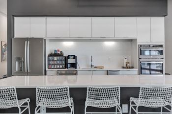 Sprawling indoor/outdoor social club with kitchen & lounges